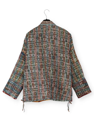 Reversible one of a kind silk jacket from collected vintage fabrics. A beautiful blend of art and craft.