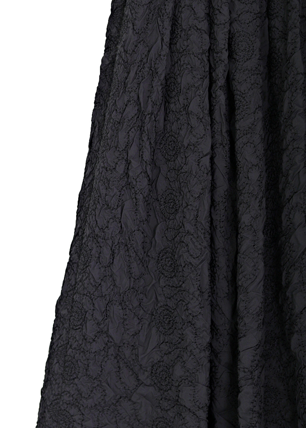 Midilång kjol med broderad struktur