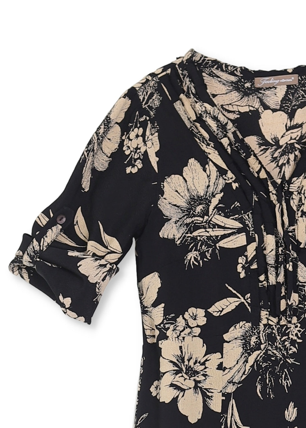 Svart och beige mönstrad klänning i crepe viskos 70-tals bohemisk look detalj vy.