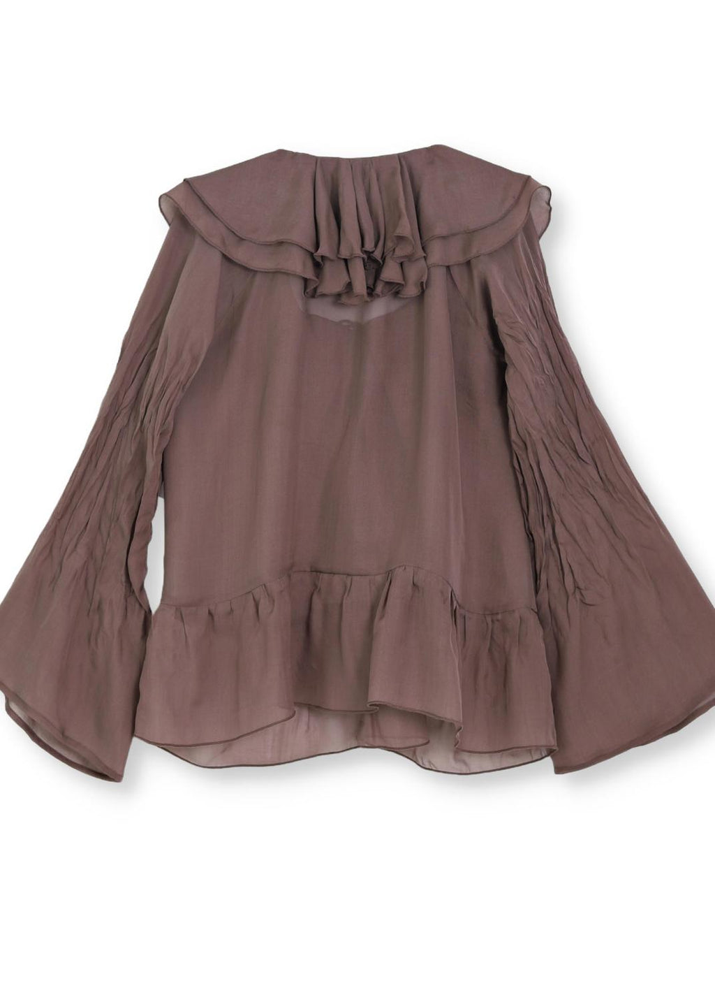 Blus med volanger i siden