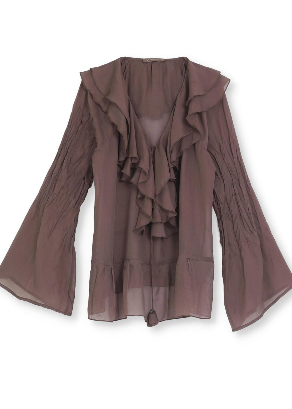 Blus med volanger i siden