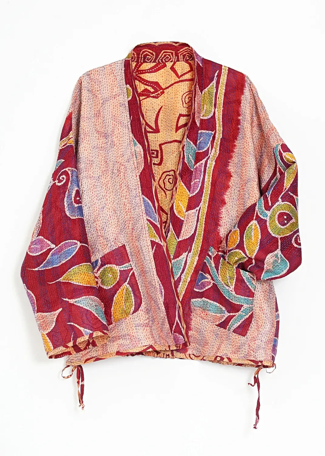 Limited edition sidenjacka med färgstarkt blad print och Kantha-stygn