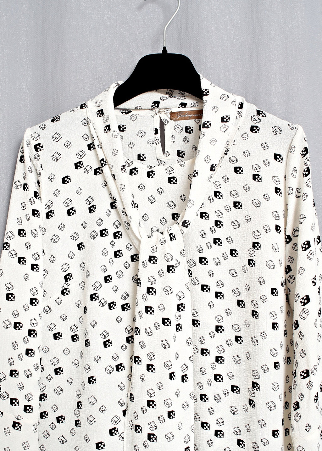 Långärmad blus med extra knyt