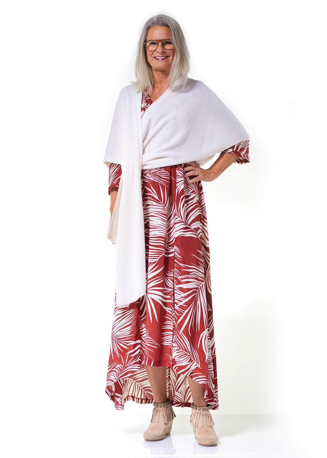 Fint stickad cape i ren kashmir med avslappnad passform från Feeling cashmere